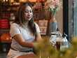 © sittinan - woman relax in cafe and use smartphone