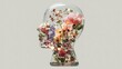 © Supachok - glass head filled with blooming flowers and gentle light, concept of mind growth and healing, minimalist style,