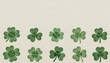 © Vladimir - Lucky clover pattern with green leaves and subtle gold sparkles