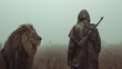 © Elena - A man with a rifle and a lion stand together in a foggy field. Post-apocalyptic survival concept with an unlikely human and animal alliance. Moody cinematic scene with copy space