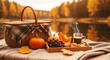 © antusher - Picnic basket with fruit and coffee on a blanket by the lake