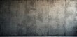 © miss irine - Grungy concrete wall texture with vertical seams and varied grey tones. Offers rough industrial background for diverse design projects. Suitable for urban or architectural themes.