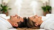 © Salman - Couple relaxing heads together spa treatment