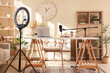 © Pixel-Shot - Interior of blogger's office with workplace, laptop, lamp and microphone on wooden table