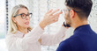 © peopleimages.com - Optometry, help or people in shop with glasses, variety or assistance in eyewear option. Healthcare, frames or optometrist in store with specs, eye wellness or optical choice in customer service.