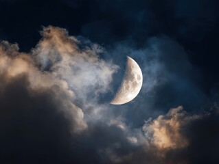  Crescent Moon Peeking Through Dark Nighttime Clouds.