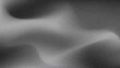 © Rifatho - Grainy dusty background with gradient black gray charcoal color. Monochrome vibrant background with blurry and noise texture.