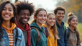 Diverse group of smiling teenagers with backpacks in outdoor setting. They appear happy and connected, suggesting friendship and school life. Friends enjoy outdoor leisure time.
