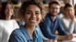 © Julia - Diverse students in classroom smiling and engaging, various ethnicities and genders, educational community, collaborative learning environment, knowledge and study concept, with copy space
