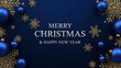 © mondaldm9 - Merry christmas and happy new year festive holiday card with blue ornaments and gold snowflakes