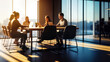 © Rahman - Business team meeting in a modern office with large windows and city view