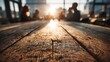 © horizon - Low angle view across a wooden conference table captures sun flare and blurred silhouettes of business people discussing in a corporate room.