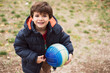 © Antonio Recena - four years old little kid with ball looking at camera