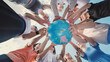© Довидович Михаил - School friends holding a globe together, symbolizing environmental protection and global unity