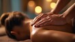 © TANATPON - Spa massage therapy with relaxing back treatment in warm candlelight for wellness and stress relief