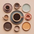 © Tichakon - An overhead shot of an array of coffee cups and saucers arranged in a circular design