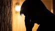 © Sirichat. Camphol - Reflective moment of solitude indoor shower setting emotional portrait warm lighting close-up view personal struggle