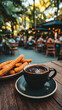 © teksomolika - Lively city cafe scene featuring churros and warm drinks at dusk