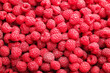 © New Africa - Fresh ripe raspberries as background, top view