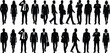 © imtiyaj - Business people silhouettes professional men and women walking standing corporate teamwork leadership isolated black white illustration office concept