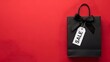 © Merry Creation - Minimal Sale Concept Shopping Bag with bow  on Red