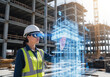 © Atmospheres - Construction engineer using augmented reality (AR) goggles to analyze digital building model on site, future technology.