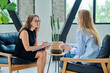 © Valerii Honcharuk - Middle aged professional female psychologist, counselor working with young woman