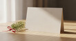 © Surgon Imaginer - Minimalist Folded Card With Pine Branch and Ribbon Mockup Stationery Scene
