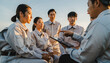 ©  A-photos - 会議を行う日本人建設作業員チーム