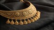 © chonchon - Beautiful Neckless gold jewellery isolated on black background side view. Jewellery stock photo.