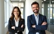 © Luna - Two business workers smiling happy standing with arms crossed gesture at the office. High quality