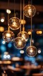 © Ramjan - Elegant pendant lights hanging in modern restaurant interior