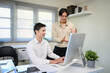 © Prathankarnpap - Young business team consulting and planning marketing strategy together using computer