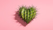 © Jess rodriguez - Green cactus heart with sharp thorns on a pink background. Concept of difficult love, painful relationships, emotional protection, and vulnerability