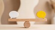 © Logo - Two speech bubbles on wooden seesaw representing balance in communication