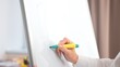 © kinomaster - Hand Drawing on Whiteboard with Green Marker