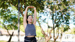 © Stella 16 - Healthy young Asian runner woman warm up the body stretching before exercise at park under warm light morning. Lifestyle fitness and active women exercise in urban city concept.