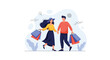 © Mehnaz - Happy couple walks together holding hands and carrying several shopping bags while enjoying a day out in the city.