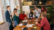 © master1305 - Creative team collaborating in modern coworking office. Concept of startup teamwork, open workspace culture, innovation mindset and collaborative business environment.