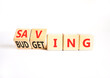 © Dzmitry - Budgeting and saving symbol. Concept words Saving to Budgeting on beautiful wooden cubes. Beautiful white table white background. Business, budgeting and saving concept. Copy space.
