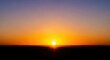 © retirementfun - Stunning golden hour sunset casts warm light over the tranquil landscape silhouette at dusk, evoking peace and serenity in the fading evening light, atmospheric, peaceful, beauty