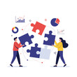 © Rohim - Two people collaborating to assemble giant puzzle pieces representing business strategy and problem solving teamwork.