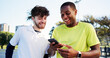 © EineroLens/peopleimages.com - Laughing, phone and sports tracking with friends outdoor for fitness or skills development. App, exercise and health tracker with funny people speaking on tennis court for mobile progress update