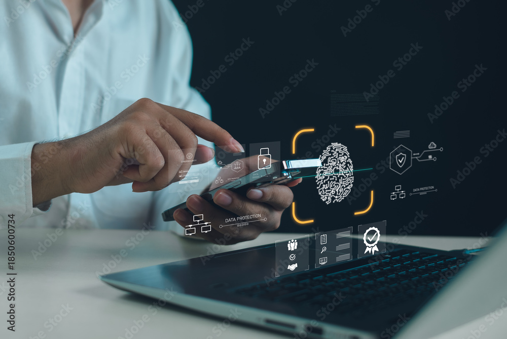 Biometric authentication and data protection concept with businessman ...