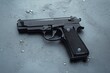 © letter - black semi-automatic pistol resting on a wet textured surface with scattered water droplets and reflective metal finish, evoking a tense, ominous and dangerous mood