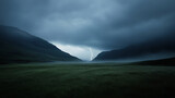 Dramatic landscape: A powerful lightning strike illuminates a valley nestled between shadowy mountains under a stormy sky, highlighting the raw force of nature in the tranquil field.