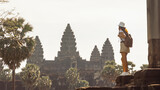Backpacker At Angkor Wat Temple At Sunrise, Cambodia Travel Inspiration