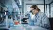 © Likhon - Scientist Looking Through A Microscope In A Sterile Lab Environment, Microbiology, Research, Science, Discovery, Focus, Equipment, Professional, Detailed