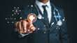 © Mahamud - Doctor interacting with futuristic digital healthcare interface and medical icons