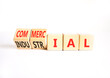 © Dzmitry - Commercial or industrial symbol. Concept words Commercial or Industrial on beautiful wooden blocks. Beautiful white background. Business commercial or industrial concept. Copy space.